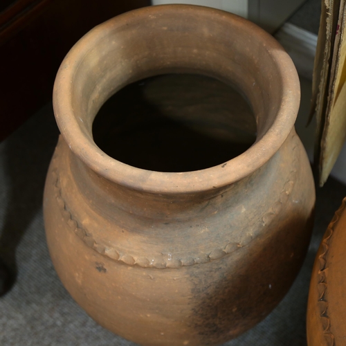 174 - 3 large Portuguese weathered terracotta olive jars, impressed makers mark to two smaller jars, talle... 