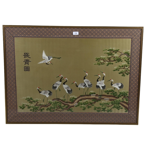 176 - A Chinese silk embroidered picture, depicting storks on a branch, machine embroidered surround, fram... 