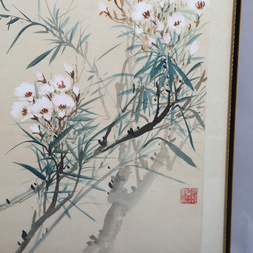 180 - A Chinese watercolour depicting 2 birds in a blossom tree, signed with seal and text inscription, pa... 