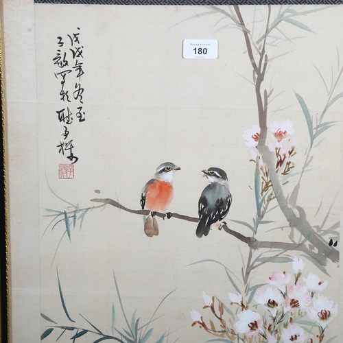 180 - A Chinese watercolour depicting 2 birds in a blossom tree, signed with seal and text inscription, pa... 