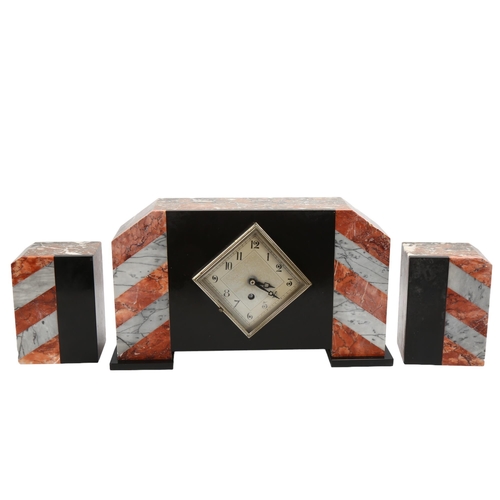 185 - A French Art Deco two-colour marble and slate-cased mantel clock garniture, replacement quartz mecha... 