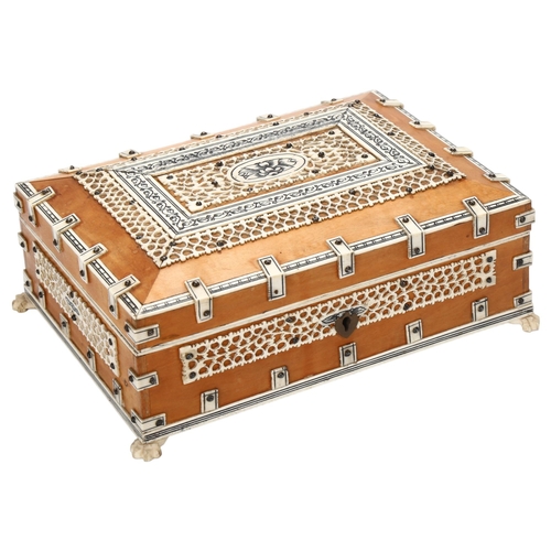 19 - A 19th century Anglo-Indian wooden Jewellery box, with bone pierced and mounted decoration, claw fee... 