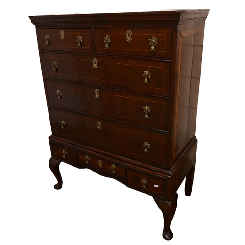 193 - A George III walnut chest on stand raised on cabriole legs, width 94cm, height 127cm