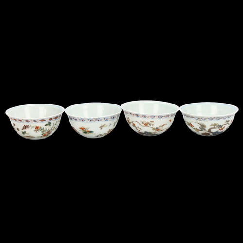 203 - A set of 4 Chinese porcelain tea bowls with painted coloured enamel decoration, diameter 8.5cm, in f... 