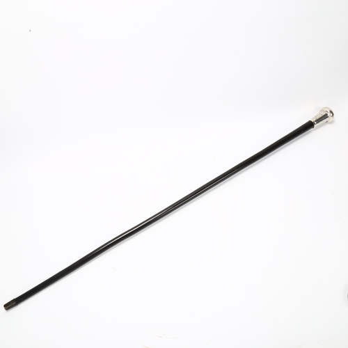 24 - An Ebony walking cane with large hand engraved silver top, hallmarked London 1925/6, length 92cm