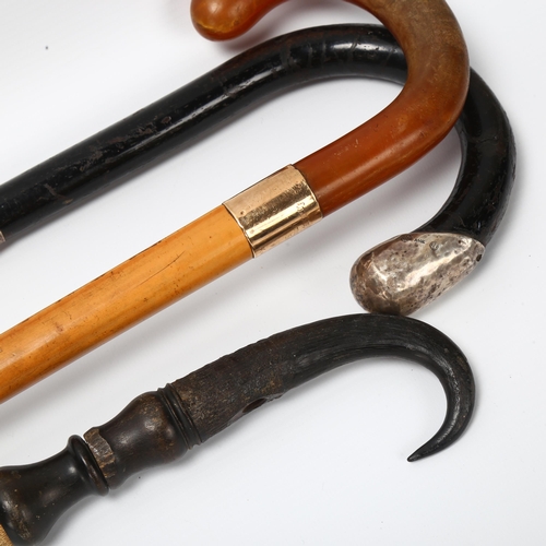 26 - 3 1920s' walking canes, 1 malacca and faux amber cane with 9ct hallmarked gold collar engraved to Co... 