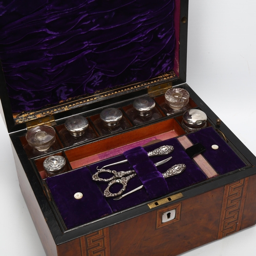 39 - A Victorian walnut and Greek Key inlaid sewing box, the interior fitted with glass and silver-topped... 