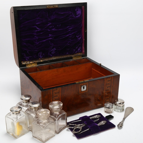 39 - A Victorian walnut and Greek Key inlaid sewing box, the interior fitted with glass and silver-topped... 