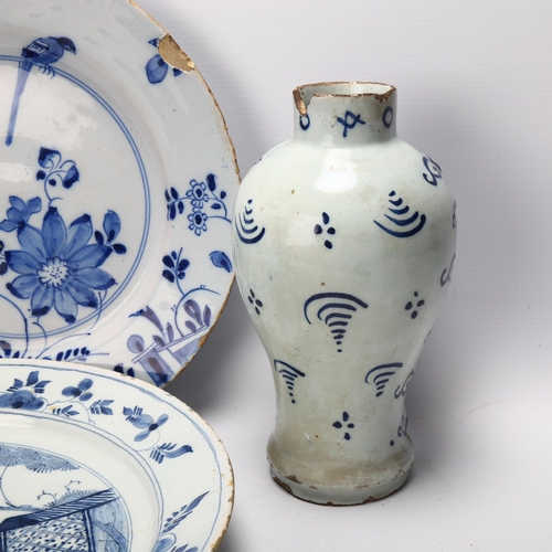 41 - 2 x 18th century Delft blue and white pottery chargers, largest 34cm diameter, and a Delft relief mo... 