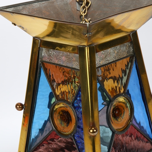 44 - A Victorian brass hanging lantern light shade, with coloured glass leadlight panels, height 29cm, wi... 