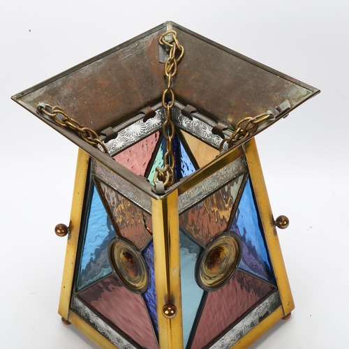 44 - A Victorian brass hanging lantern light shade, with coloured glass leadlight panels, height 29cm, wi... 