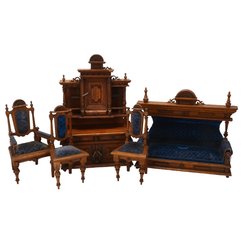 46 - A set of early 20th century oak dolls furniture, dresser, upholstered sofa and two chairs, dresser h... 