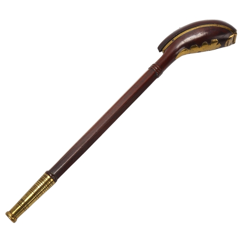 47 - An 18th/19th century Dutch rosewood and brass clay pipe holder, length 29cm