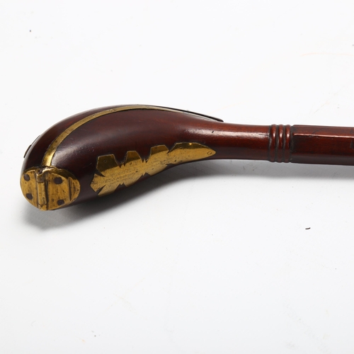 47 - An 18th/19th century Dutch rosewood and brass clay pipe holder, length 29cm