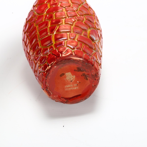 49 - Zsolnay Pecs, Hungary, a red lustre crackle glaze ewer, makers stamp to base, height 31cm