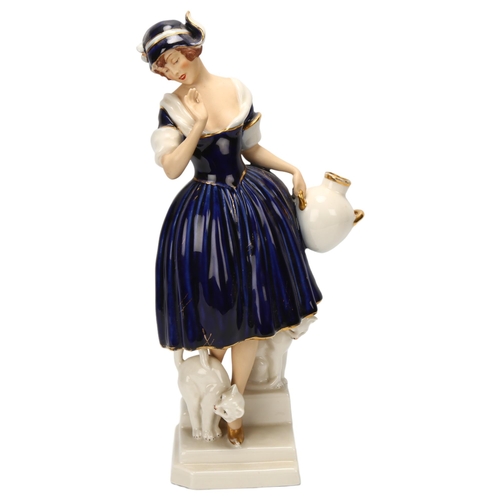 52 - A Royal Dux, Art Deco ceramic group of a woman and cat, makers marks under base, height 32cm