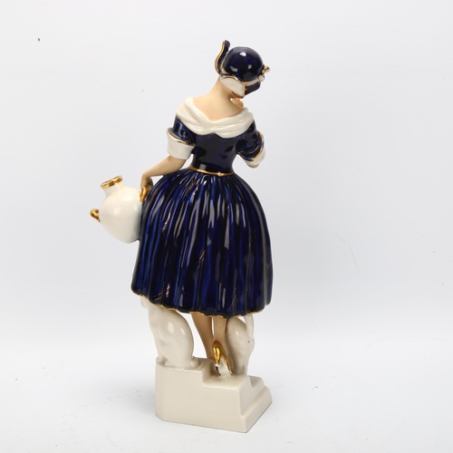 52 - A Royal Dux, Art Deco ceramic group of a woman and cat, makers marks under base, height 32cm