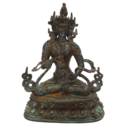 55 - A verdigris patinated metal Buddah, height 21cm