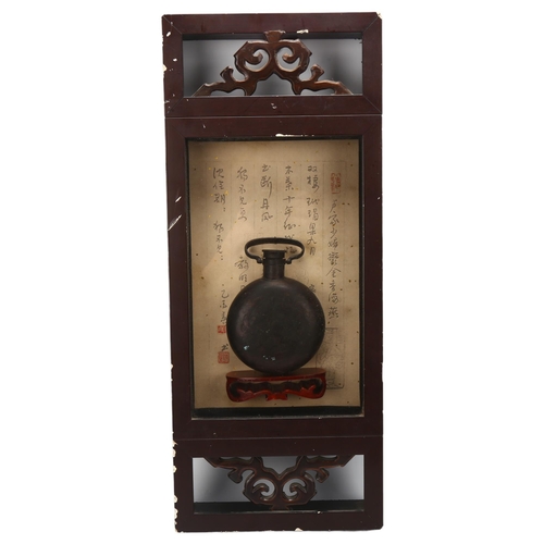 60 - A Chinese engraved patinated brass flask, mounted in lacquered glazed wall-hanging cabinet, height 5... 