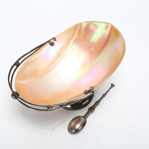 61 - A silver-mounted abalone shell bon bon basket with swing handle, length 12cm, with silver spoon