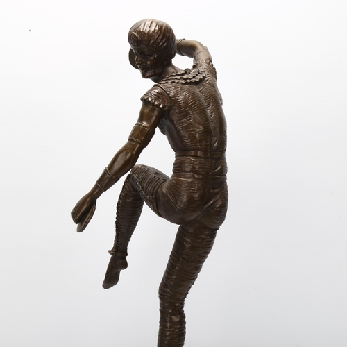 64 - A reproduction bronze dancing figure on marble base, height 58cm