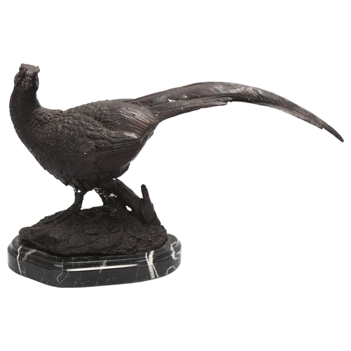 73 - A reproduction patinated bronze pheasant on marble base, length approx 36cm