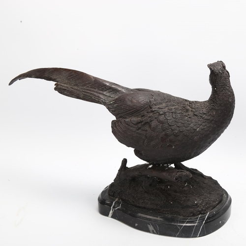 73 - A reproduction patinated bronze pheasant on marble base, length approx 36cm