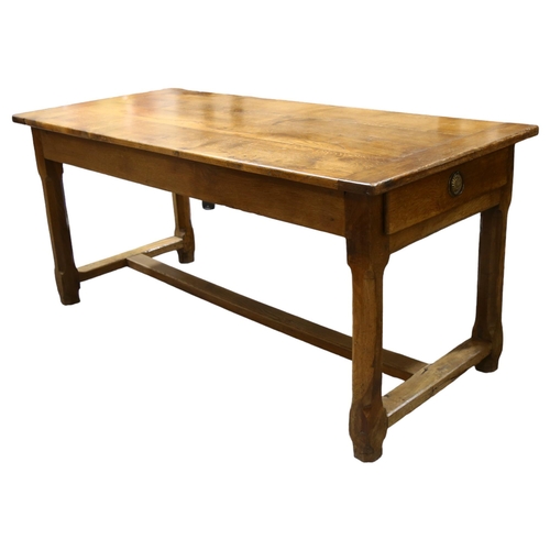 74 - A 19th century Oak refectory table,  with single end drawer, chamfered legs and H shaped stretcher, ... 