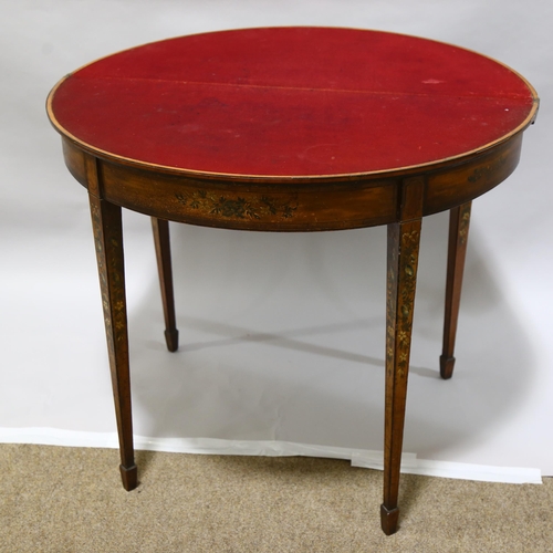 75 - A 19th century satinwood demi-lune fold over card table, with rosewood inlaid top, the base having b... 