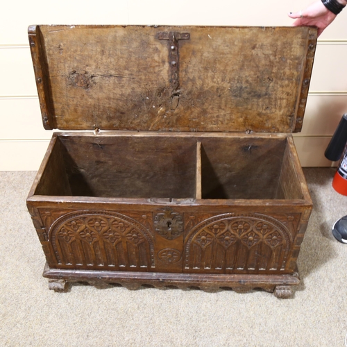 81 - An 18th century oak coffer of small size, of plank construction, with chip carved Arcadian front, 82... 