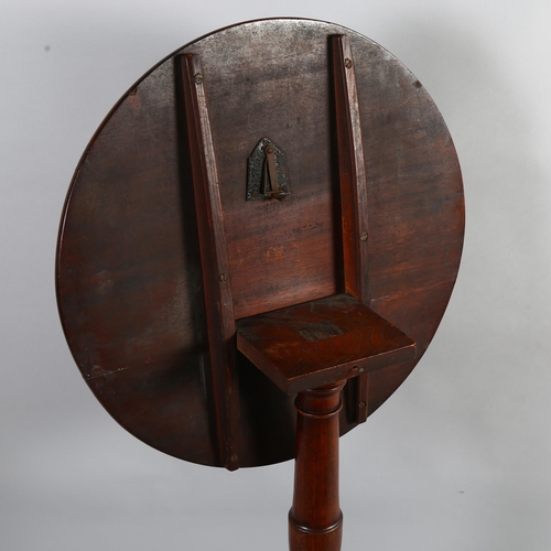 85 - A Georgian circular mahogany tilt-top table, on tripod base, diameter 55cm