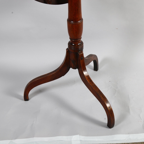 85 - A Georgian circular mahogany tilt-top table, on tripod base, diameter 55cm