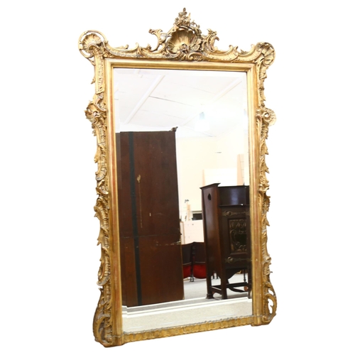 87 - A 19th century pier mirror with bevelled glass and Rococo style gilt frame, height 150cm, width 91cm