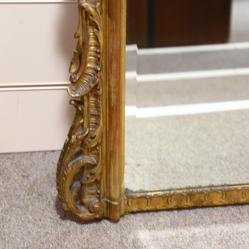 87 - A 19th century pier mirror with bevelled glass and Rococo style gilt frame, height 150cm, width 91cm