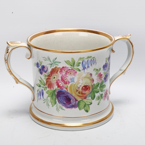 91 - A large 19th century English pottery 2-handled loving cup, with hand painted scene depicting church ... 