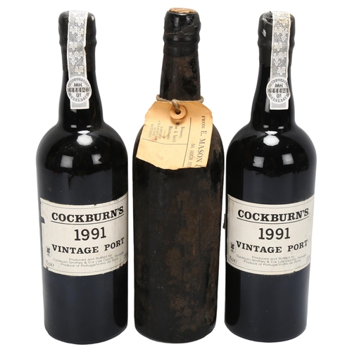 97 - 2 bottles of Cockburn's 1991 Vintage Port wine, together with another vintage bottle unmarked with m... 