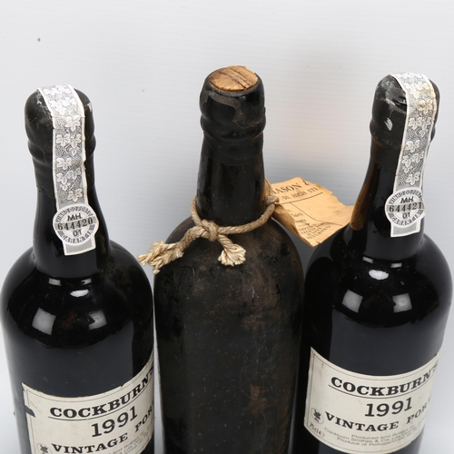 97 - 2 bottles of Cockburn's 1991 Vintage Port wine, together with another vintage bottle unmarked with m... 