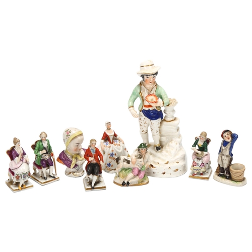 99 - A group of miniature porcelain figures, and a 19th century Staffordshire porcelain figure holding a ... 