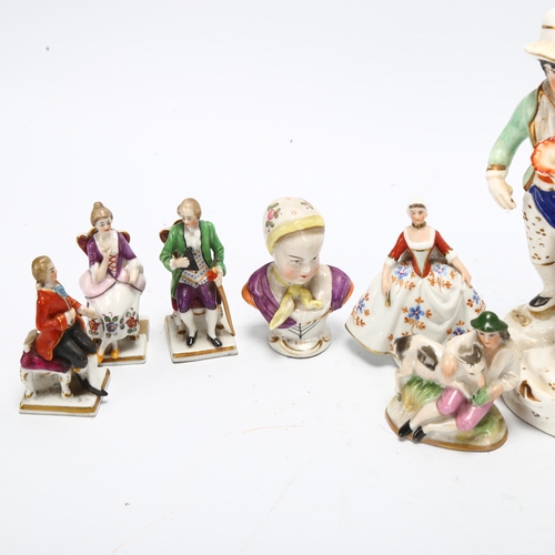 99 - A group of miniature porcelain figures, and a 19th century Staffordshire porcelain figure holding a ... 