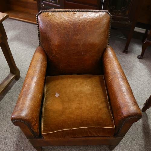 208 - A vintage brown leather club chair, height 83cm, width 72cm