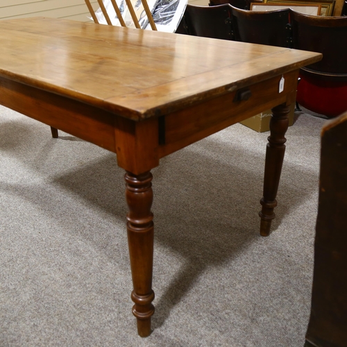 209 - A continental cherry wood farmhouse table, with single end drawer and slide at opposite end, length ... 