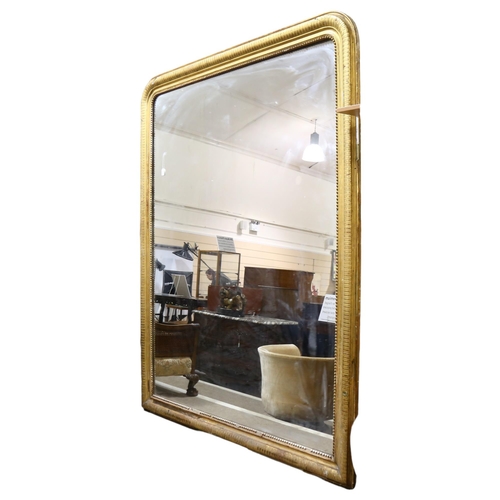 212 - An extremely large Louis Phillipe mirror, with gilt gesso cushion and beaded frame, 230 x180cm