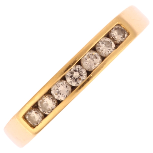 1257 - A modern 18ct gold diamond quarter eternity ring, channel set with modern round brilliant-cut diamon... 