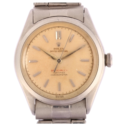 ROLEX - a stainless steel Oyster Perpetual 'Bubble-Back' automatic bracelet watch, ref. 6106, circa 1952, white dial with applied arrowhead hour markers, sweep centre seconds hand, red "officially" certified chronometer, with stainless steel Oyster expanding riveted bracelet, 2 jewel movement with calibre 76296, serial no. 802568, case width 34mm, working order with service box and papers