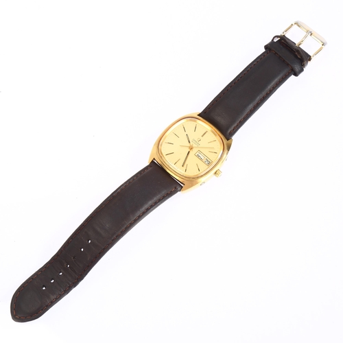 1012 - OMEGA - a gold plated stainless steel Day/Date quartz wristwatch, ref. 196.0066, circa 1975, champag... 