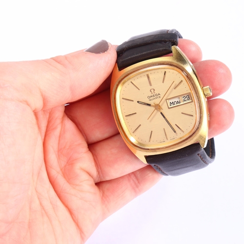 1012 - OMEGA - a gold plated stainless steel Day/Date quartz wristwatch, ref. 196.0066, circa 1975, champag... 