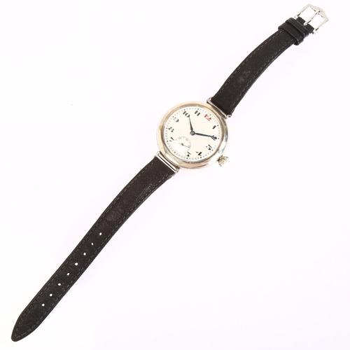 1013 - LONGINES - an early 20th century silver Officer's style mechanical wristwatch, circa 1920s, white en... 