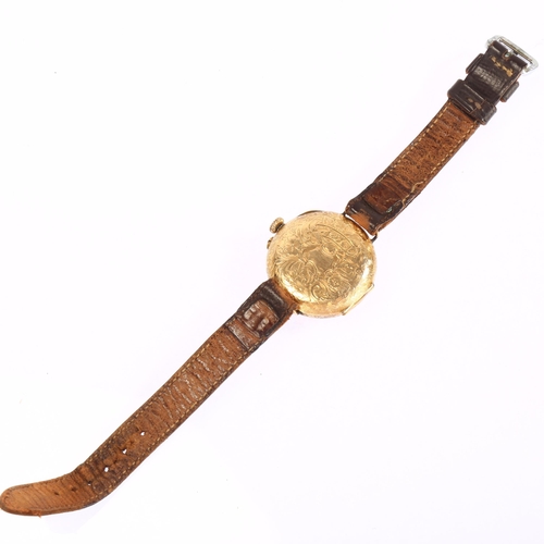 1017 - A Continental 14ct gold converted fob watch wristwatch, engraved floral dial with Roman numeral hour... 