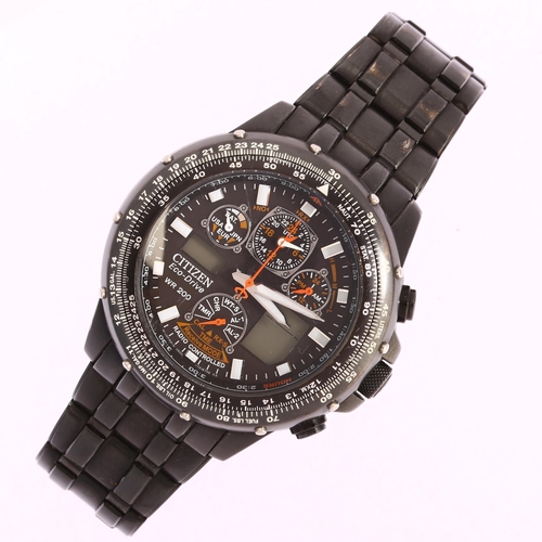 1023 - CITIZEN - a black PVD stainless steel Eco-Drive Skyhawk radio controlled quartz chronograph bracelet... 