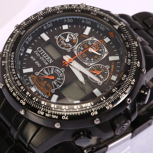 1023 - CITIZEN - a black PVD stainless steel Eco-Drive Skyhawk radio controlled quartz chronograph bracelet... 